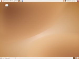 Abbildung 4: Der Ubuntu-Desktop sieht aufgeräumt und etwas leer aus. Für den Zugriff auf die Windows-Partition gibt es bereits ein Icon.