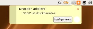 Abbildung 4: Optimal: Gutsy Gibbon vermeldet, dass der Drucker einsatzbereit ist. Die deutsche Übersetzung lässt allerdings noch Raum für Verbesserungen.