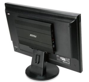 Die MSI-Wind-Netbox mit Atom-N270-CPU, 1 GByte Arbeitsspeicher und 120-GByte-Festplatte logiert direkt auf der Rückseite eines Bildschirms.