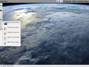 Abbildung 2: Die Gnome Shell mit eingefahrener Seitenleiste. Befindet sich der Mauszeiger über <code srcset=
