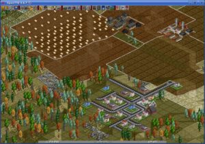 Abbildung 2: Open Transport Tycoon: Die Felder strukturieren die Landschaft nicht nur, sie wechseln auch, abhängig von der Jahreszeit, ihr Aussehen.