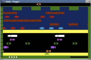 Abbildung 7: Frogger: Der kleine grüne Frosch am unteren Bildrand muss in eine der oberen Mulden gelenkt werden