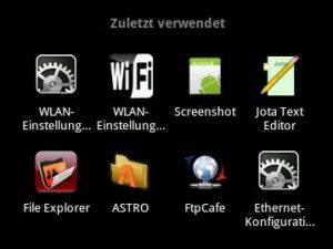 Abbildung 3: Ein Taskwechsel erfordert den Einsatz beider Hände: Mit links gilt es die Home-Taste gedrückt zu halten, mit rechts über die Pfeiltasten im Taskswitcher das Gewünschte auszuwählen.