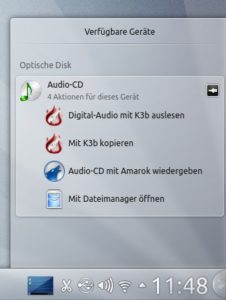 Abbildung 4: Legen Sie eine Audio-CD ins Laufwerk, schlägt die "Geräteüberwachung" diverse Aktionen vor, die Sie auf das Gerät anwenden können.