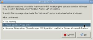 Abbildung 3: Beim Zugriff auf NTFS-Partitionen umgeht Knoppix mögliche Probleme mit einem "schlafen gelegten" Windows automatisch. Hier sehen Sie noch einen kleinen Bug: Die Meldung sollte natürlich automatisch in Deutsch erscheinen statt in Englisch.