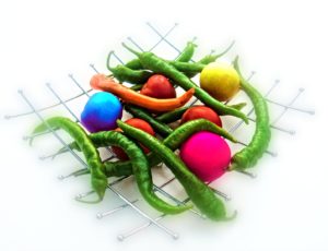 Abbildung 12: Wenn schon die Farben der Tomaten purer Phantasie entspringen, schaden ein paar weitere verfremdende Effekte (Weichzeichner, Velvia-Farben, künstliches Filmkorn) auch nicht mehr.