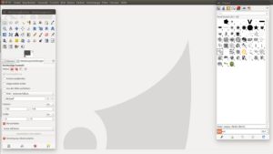 Abbildung 1: Die Arbeitsoberfläche von Gimp ist dreigeteilt und besteht aus dem Bildfenster, der Werkzeugleiste und einem Dock für andockbare Dialoge.