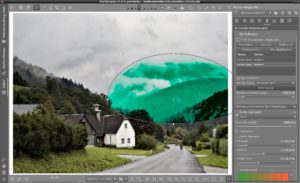 Abbildung 4: Wenn Sie den Bereich der Auswahl mit dem Bereichsregler reduzieren, ver&auml;ndert Rawtherapee lediglich das Blau der Berge, nicht aber die ebenfalls ausgew&auml;hlten Wolken.