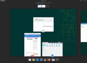 Abbildung 4: Die sich nach Dr&uuml;cken der Windows/Super-Taste &ouml;ffnende Aktivit&auml;ten-Ansicht kombiniert unter Gnome Programmstarter-Dock, Startmen&uuml; mit Suchfunktion sowie Fenster- und Arbeitsfl&auml;chenverwaltung in einem Schirm. Sie ist in ihrer Komplexit&auml;t zumindest gew&ouml;hnungsbed&uuml;rftig.