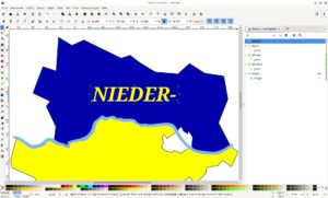 Abbildung 5: Die Beschriftung der beiden Landesh&auml;lften erfolgt mit dem Text-Werkzeug.